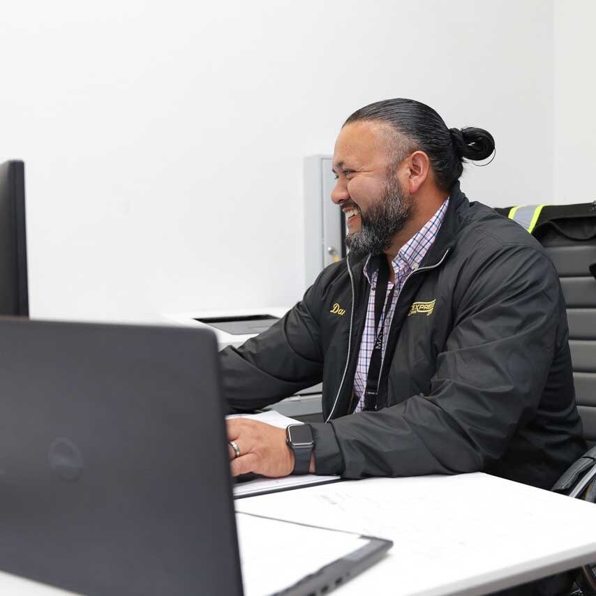 Man Looking At Computer Screens